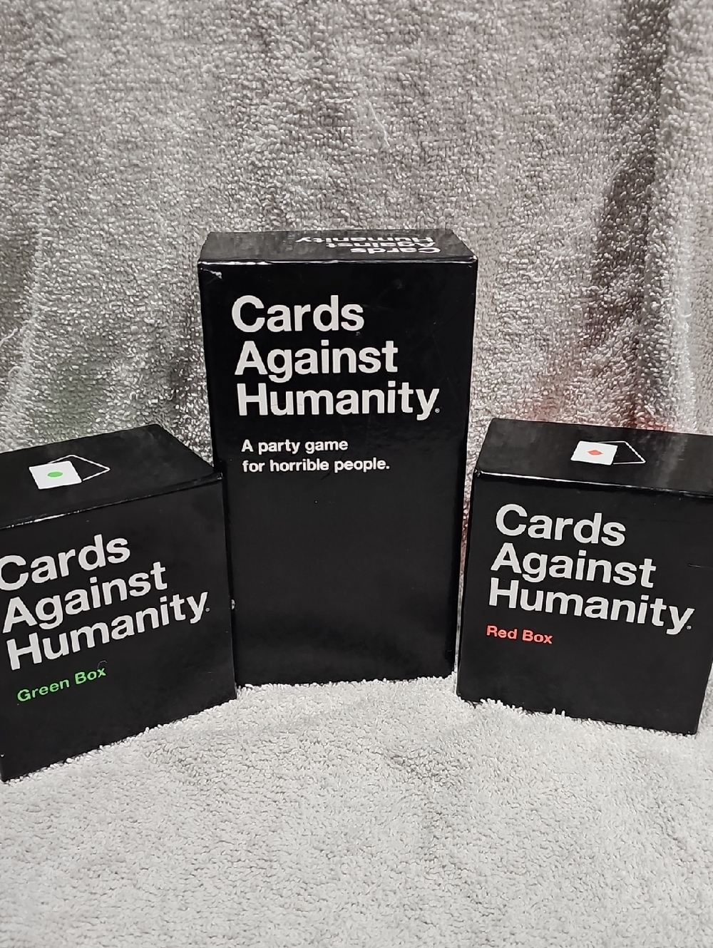 Cards Against Humanity Base Game + Red and Green Boxes